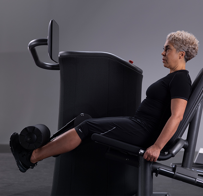 E-gym : femme pendant son entraînement intelligent chez My Loft Sport Club